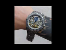 Cargar y reproducir el video en el visor de la galería, Reloj Khaos Célebre