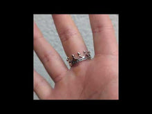 Cargar y reproducir el video en el visor de la galería, Anillo corona
