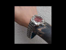 Cargar y reproducir el video en el visor de la galería, Reloj garra con cambios de color
